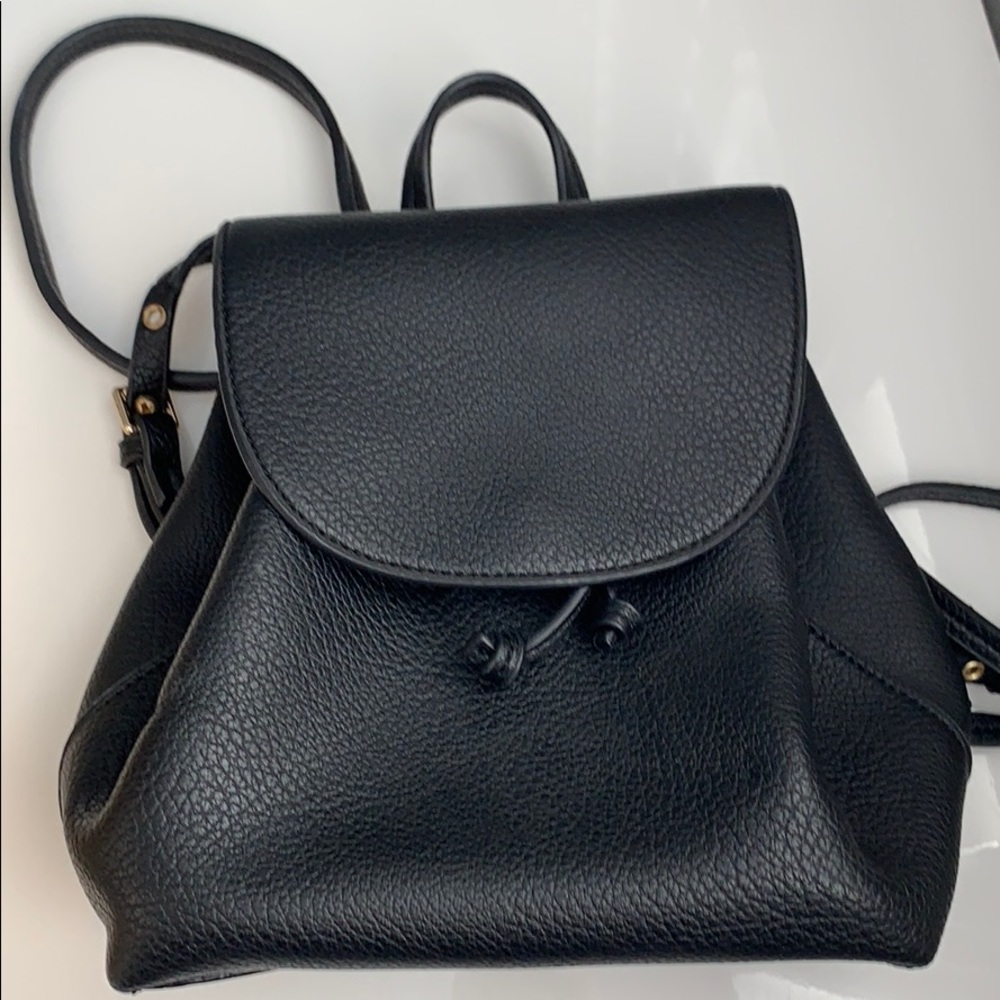 Black vegan leather mini sole society backpack.
